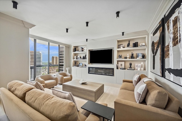 living room featuring built in shelves and crown molding