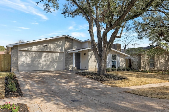 single story home with a garage