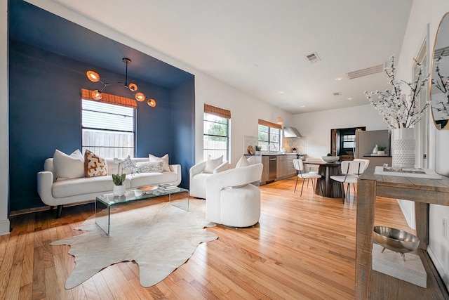 living room featuring light wood-type flooring