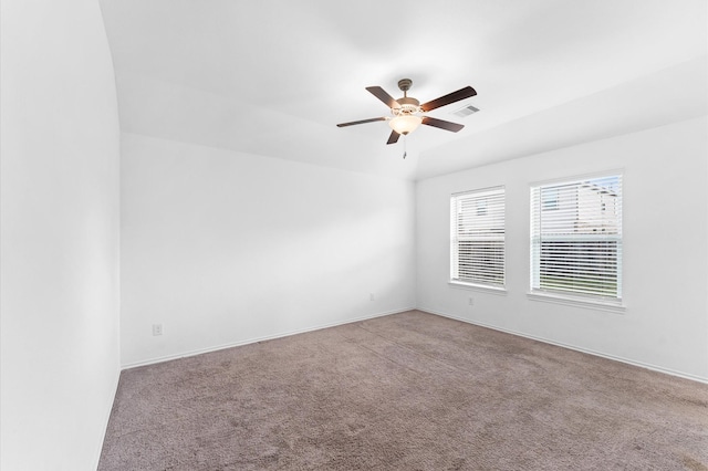 unfurnished room with light carpet and ceiling fan