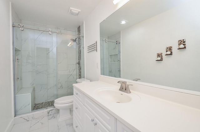 bathroom with walk in shower, vanity, and toilet