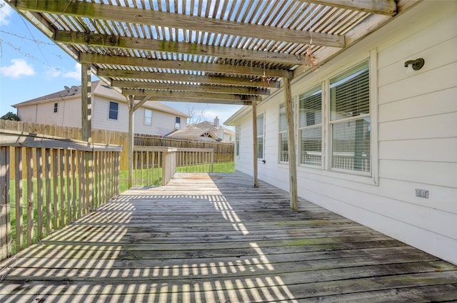 wooden terrace with a pergola and fence