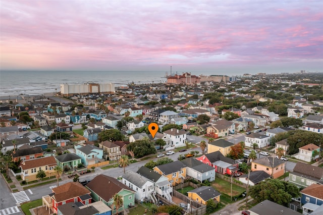 1621 Ursuline St, Galveston, TX 77550 - aerial view at dusk featuring a water view and a residential view