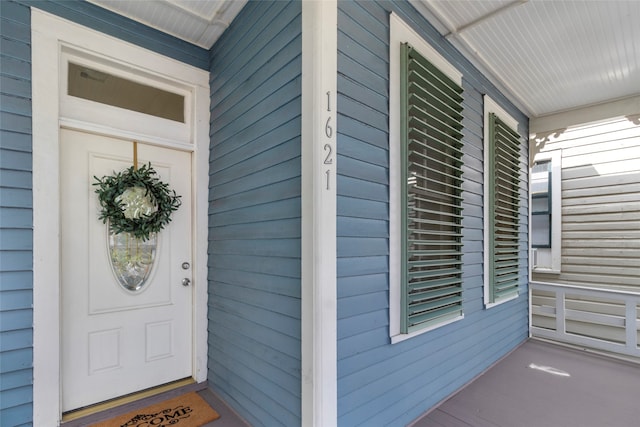 1621 Ursuline St, Galveston, TX 77550 - doorway to property with a porch