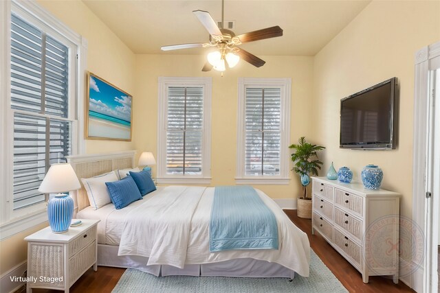 1621 Ursuline St, Galveston, TX 77550 - bedroom with dark wood-style flooring and a ceiling fan