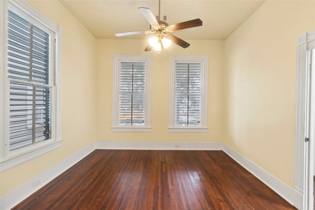 1621 Ursuline St, Galveston, TX 77550 - empty room with a ceiling fan, baseboards, and dark wood finished floors