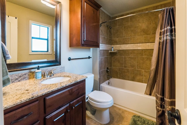 full bathroom featuring tile patterned floors, vanity, toilet, and shower / bath combo with shower curtain