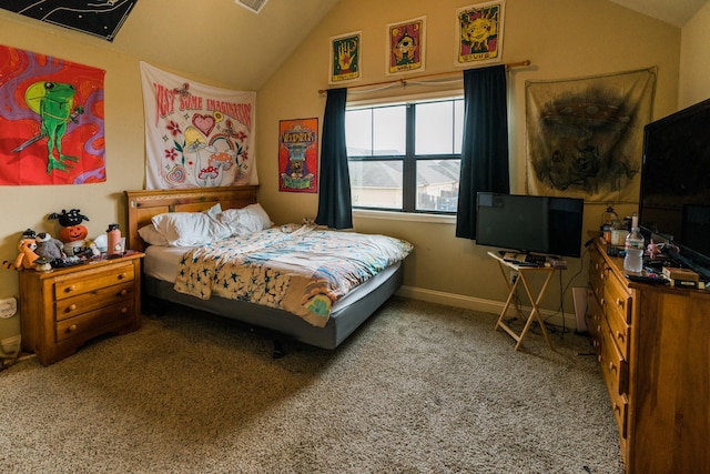 bedroom featuring vaulted ceiling and carpet