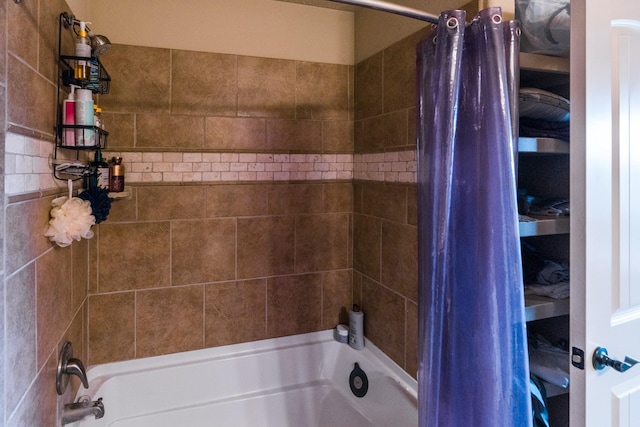 bathroom with shower / bathtub combination with curtain