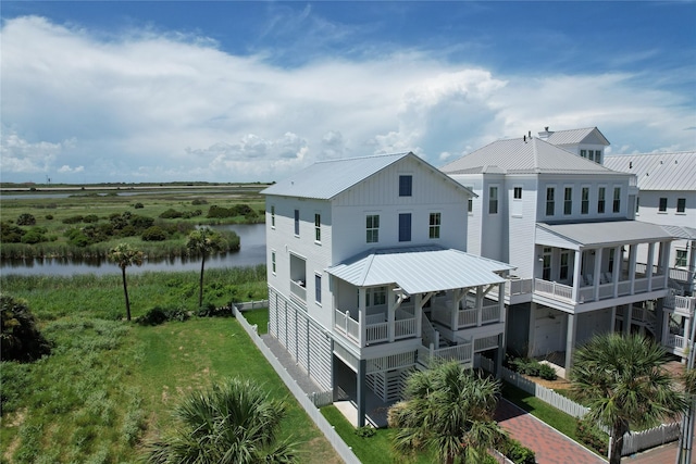 exterior space with a water view