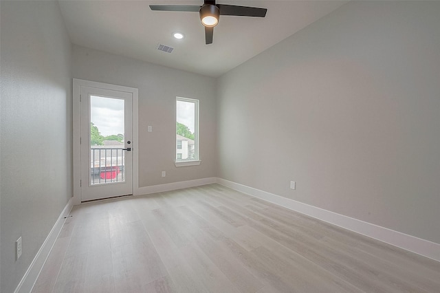 unfurnished room with ceiling fan and light hardwood / wood-style flooring