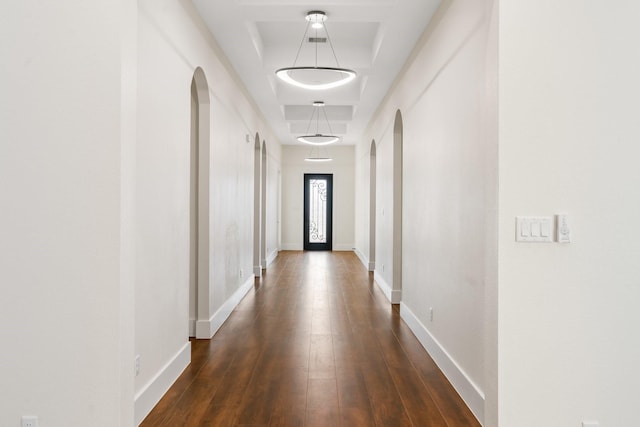 hallway featuring dark hardwood / wood-style floors