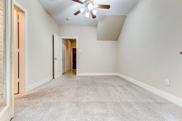 unfurnished bedroom featuring carpet floors and ceiling fan