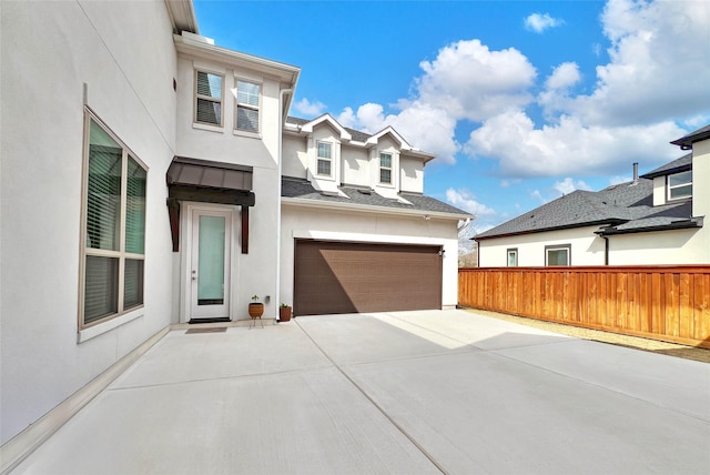 view of front of home featuring a garage