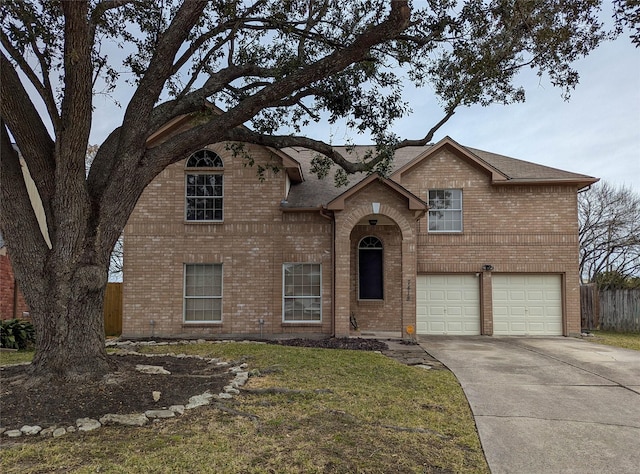 view of front facade with a garage and a front lawn