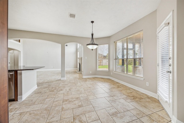 view of unfurnished dining area