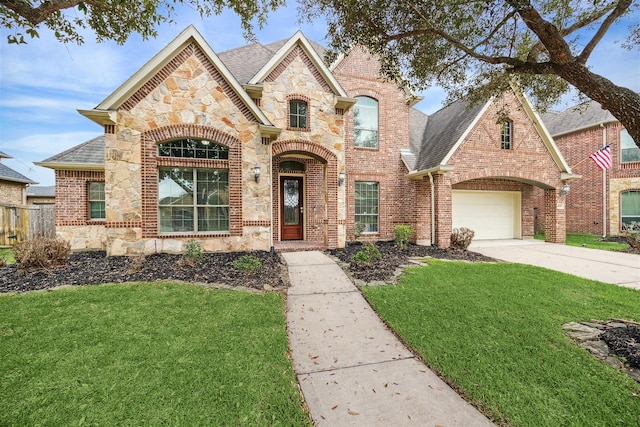 view of front facade featuring a garage and a front lawn