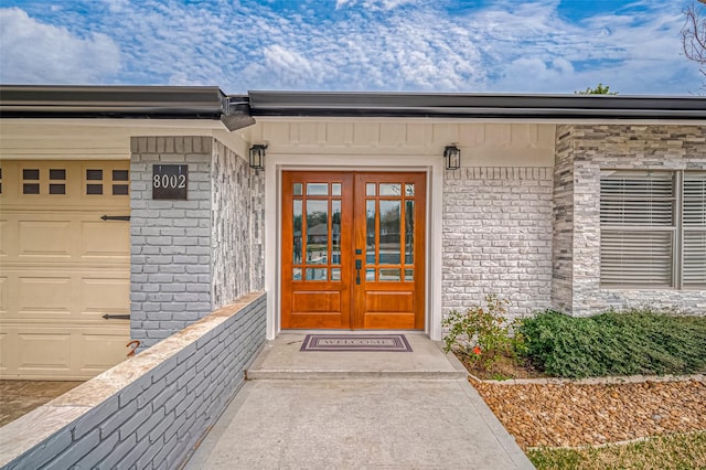 doorway to property featuring french doors