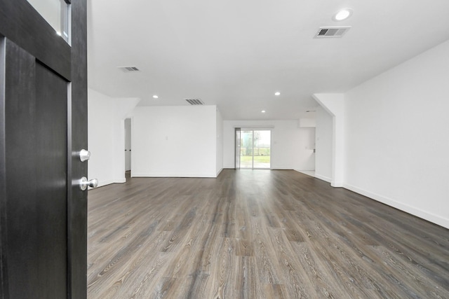 spare room featuring hardwood / wood-style floors