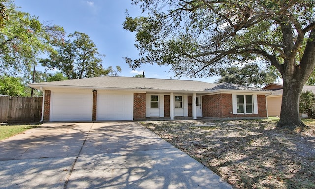 single story home with a garage