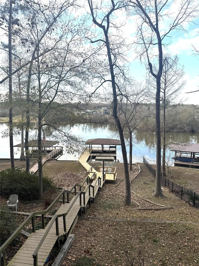 dock area featuring a water view