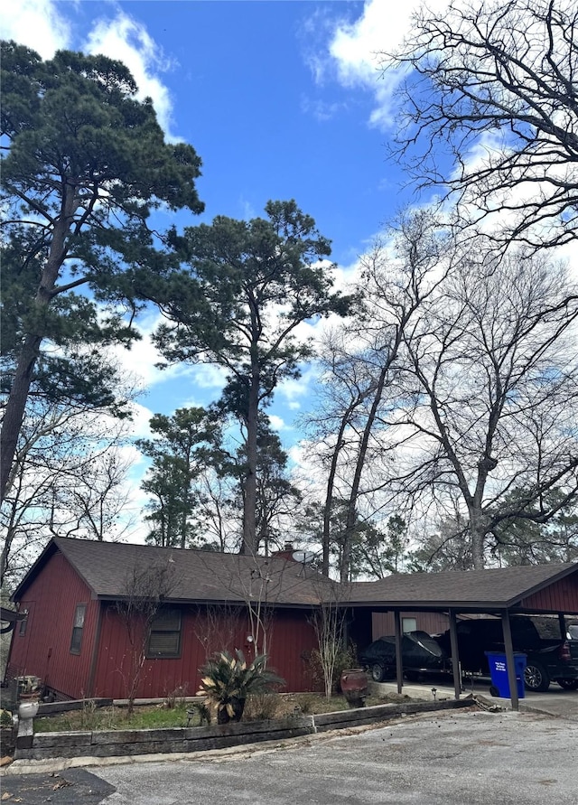 exterior space featuring a carport