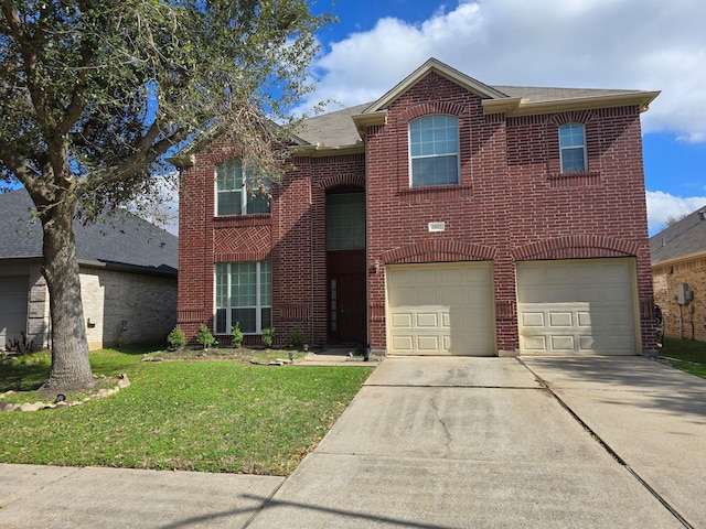 traditional home with an attached garage, a front yard, concrete driveway, and brick siding