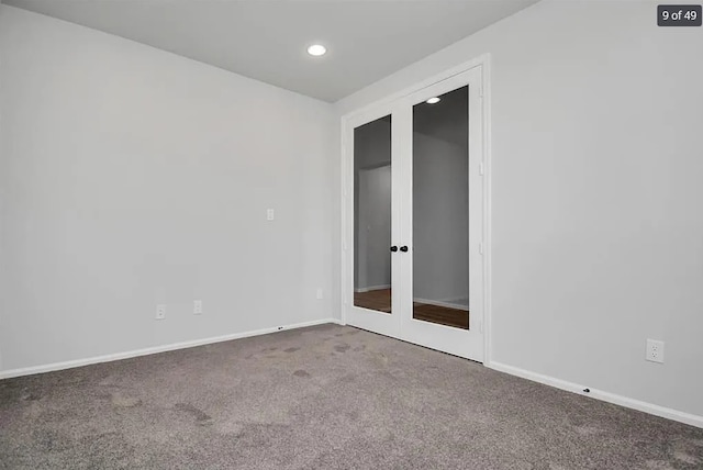 spare room featuring carpet floors