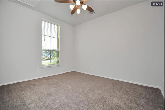 empty room featuring carpet and ceiling fan