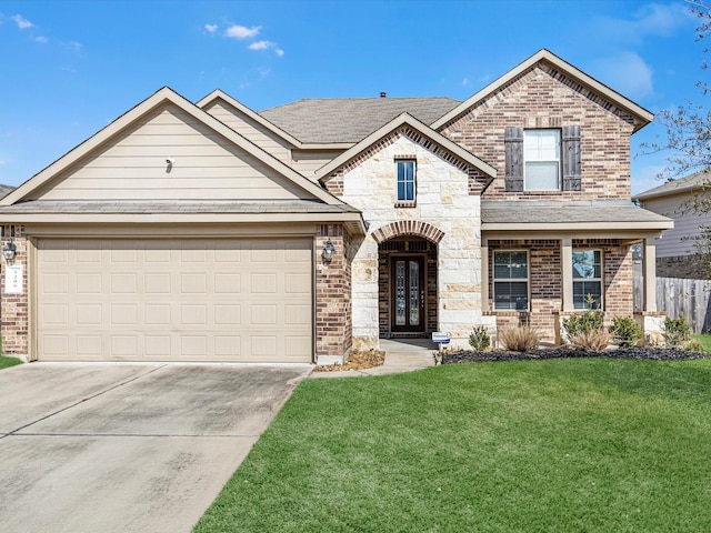 view of front of property with brick siding, an attached garage, stone siding, driveway, and a front lawn