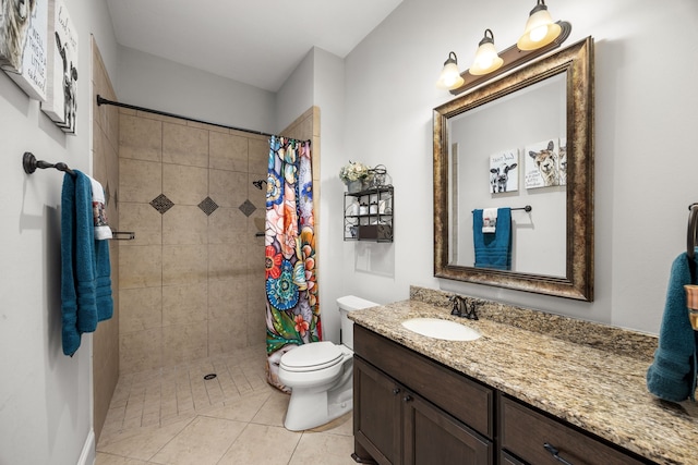 bathroom with tile patterned floors, vanity, toilet, and a shower with shower curtain