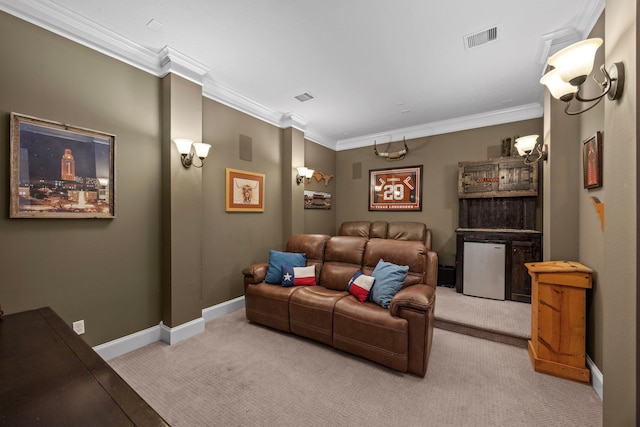 cinema room featuring crown molding and light carpet