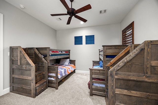 bedroom featuring ceiling fan and light colored carpet