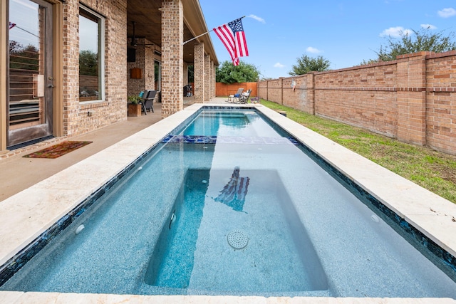 view of pool with a patio area