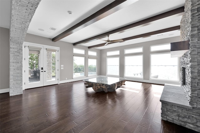 16434 Clear Water Cir, Montgomery, TX 77356 - living room featuring ceiling fan, baseboards, beam ceiling, hardwood / wood-style floors, and french doors