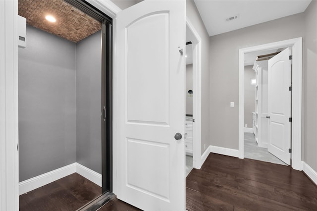 16434 Clear Water Cir, Montgomery, TX 77356 - corridor featuring dark wood-type flooring and baseboards