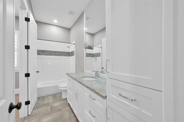 full bath featuring bathtub / shower combination, toilet, recessed lighting, visible vents, and vanity