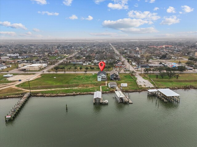 822 W 2nd St, Freeport, TX 77541 - aerial perspective of suburban area featuring a nearby body of water