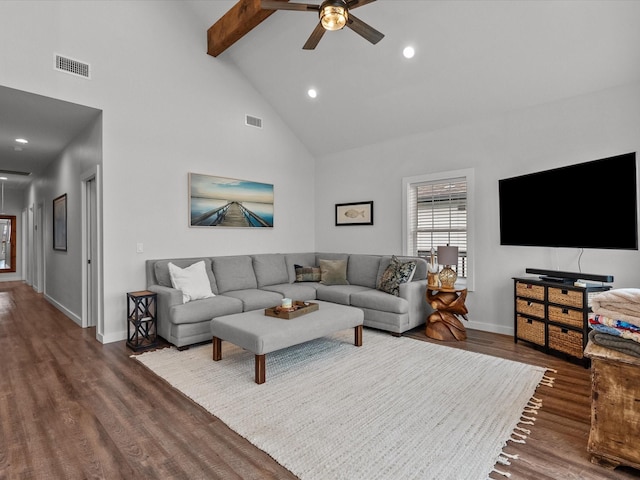 living room with hardwood / wood-style flooring, ceiling fan, high vaulted ceiling, and beamed ceiling