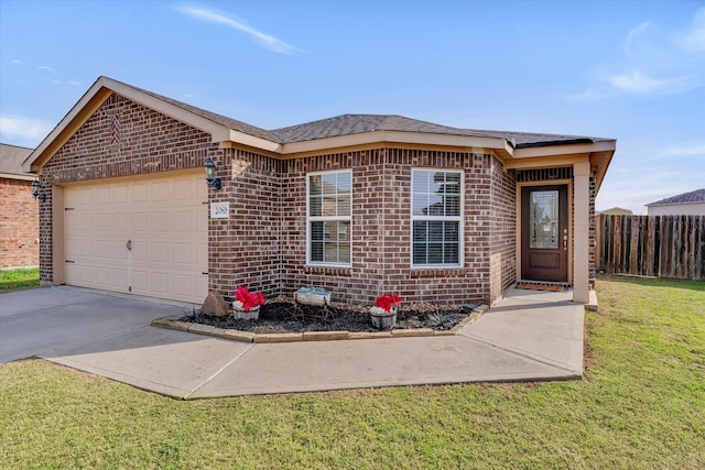 ranch-style home featuring a garage and a front lawn