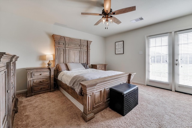 carpeted bedroom featuring access to outside and ceiling fan