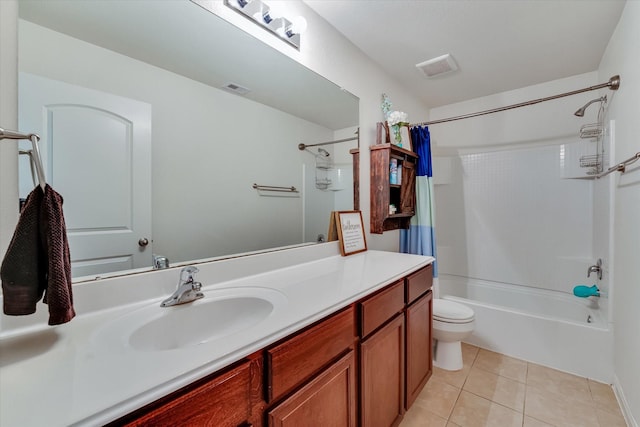 full bathroom with tile patterned flooring, vanity, toilet, and shower / bath combo with shower curtain