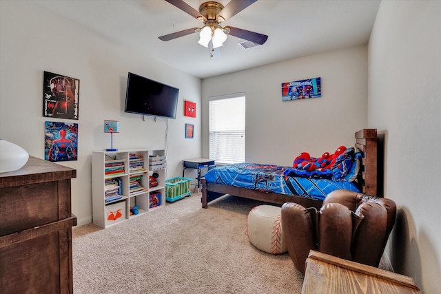 carpeted bedroom featuring ceiling fan