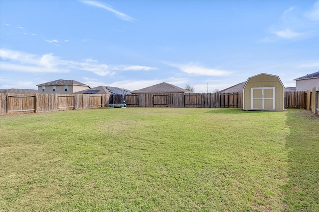 view of yard with a storage shed