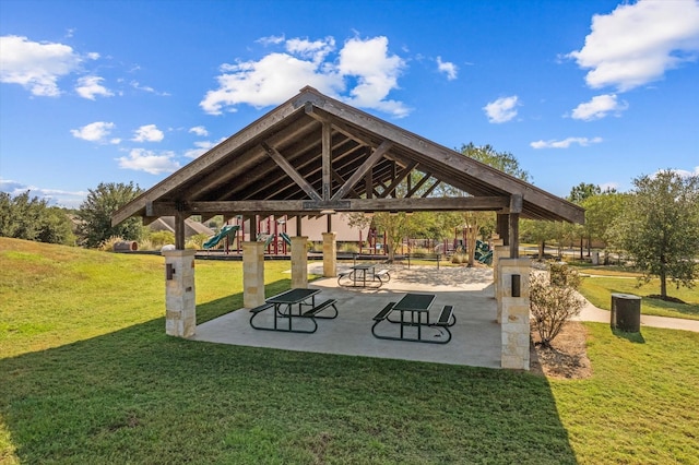 view of property's community with a gazebo, a yard, and a playground