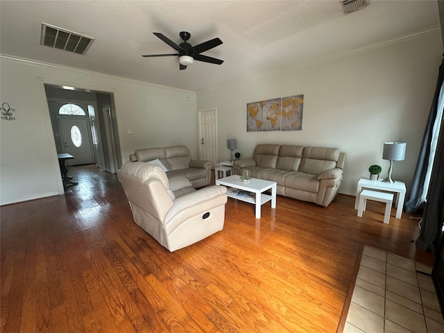 1723 Park Ridge Dr, Katy, TX 77450 - living room featuring ceiling fan, wood finished floors, and ornamental molding