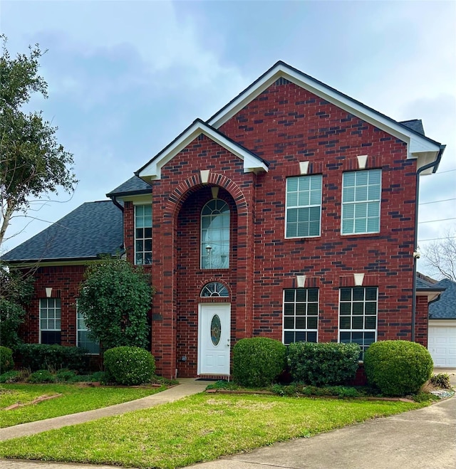 view of front of home with a front yard