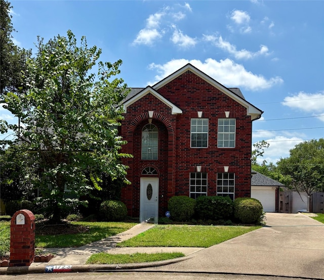 1723 Park Ridge Dr, Katy, TX 77450 - traditional home featuring brick siding and a detached garage