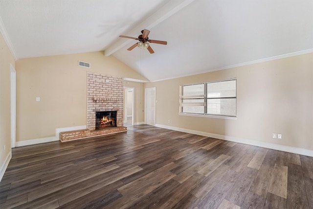 unfurnished living room featuring lofted ceiling with beams, dark wood-type flooring, a fireplace, and ceiling fan