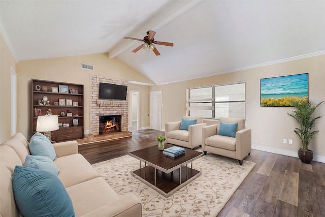 living room featuring ceiling fan, wood-type flooring, a fireplace, and lofted ceiling with beams